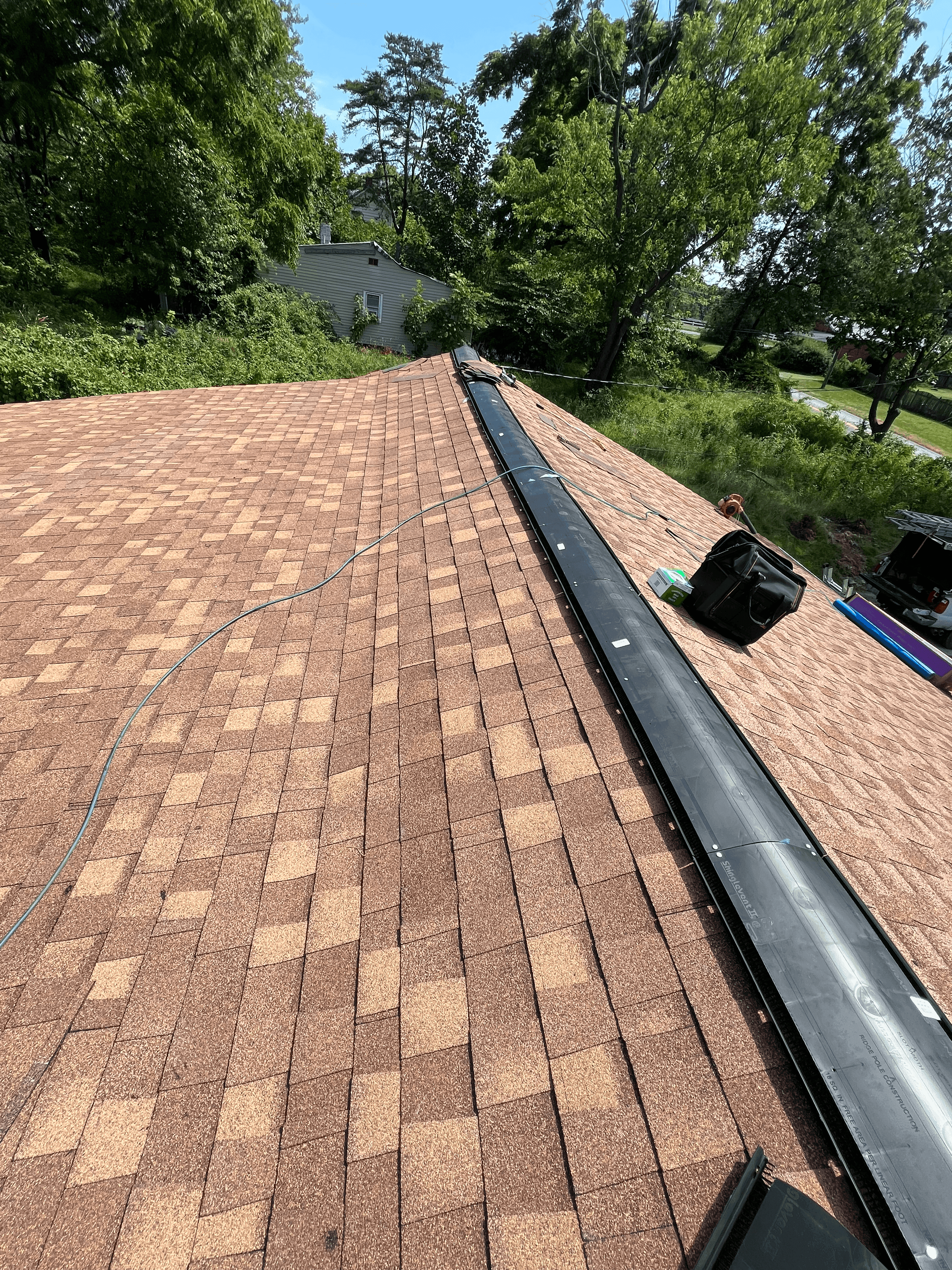 Apper Construction installing a new roofing system on a home in Crofton, MD