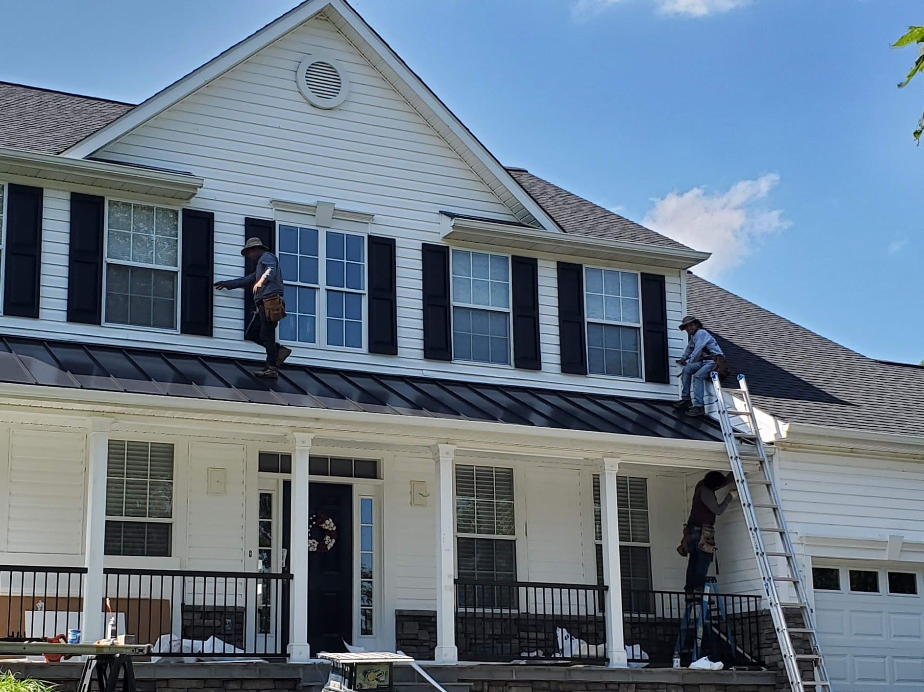 Two-story colonial home in Severn, Maryland with a newly installed asphalt shingle roof by Apper Construction
