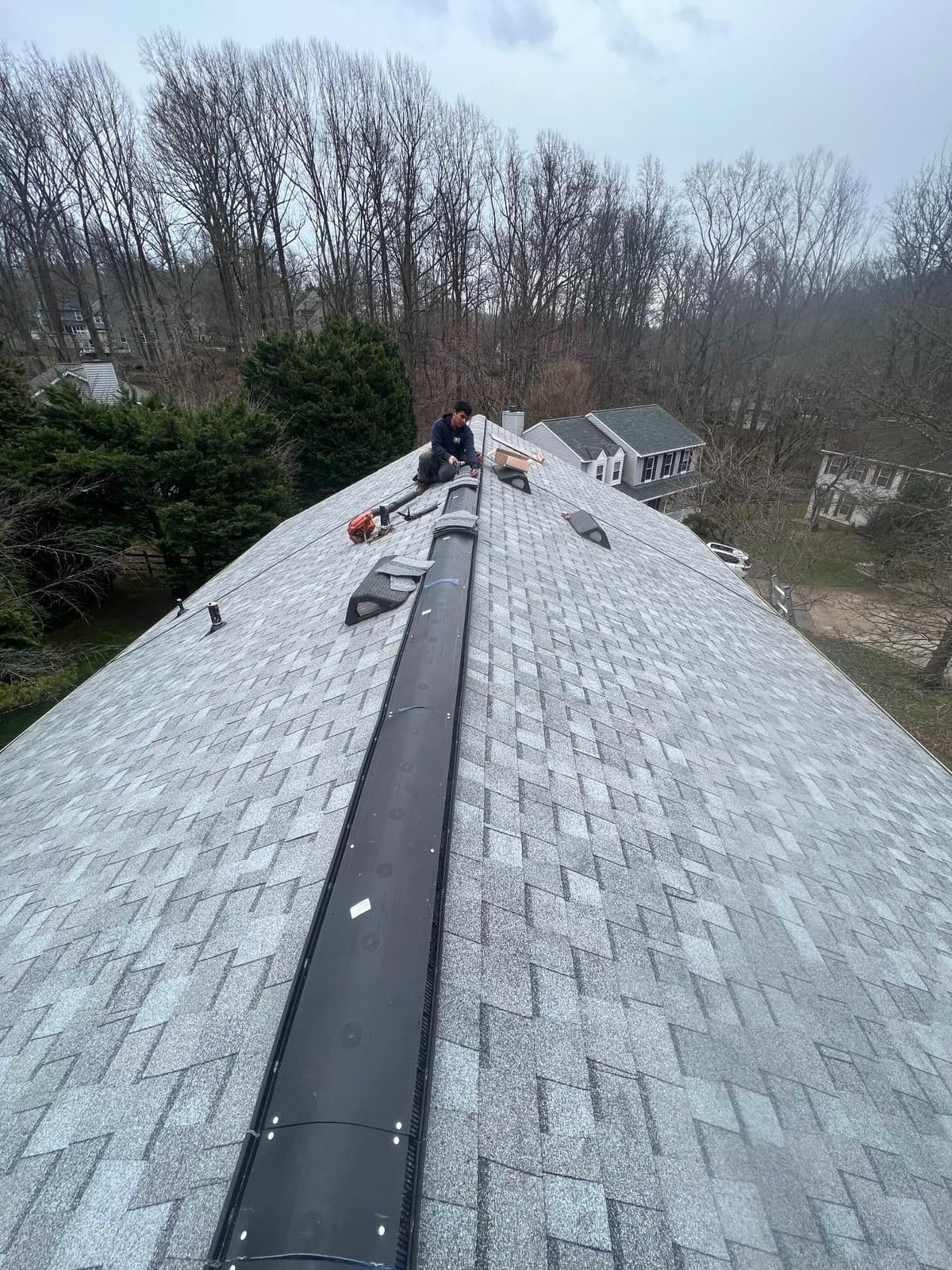 New asphalt shingle roof on a Columbia, MD home in Howard County (21044) — installed by Apper Construction, MHIC #05-146983