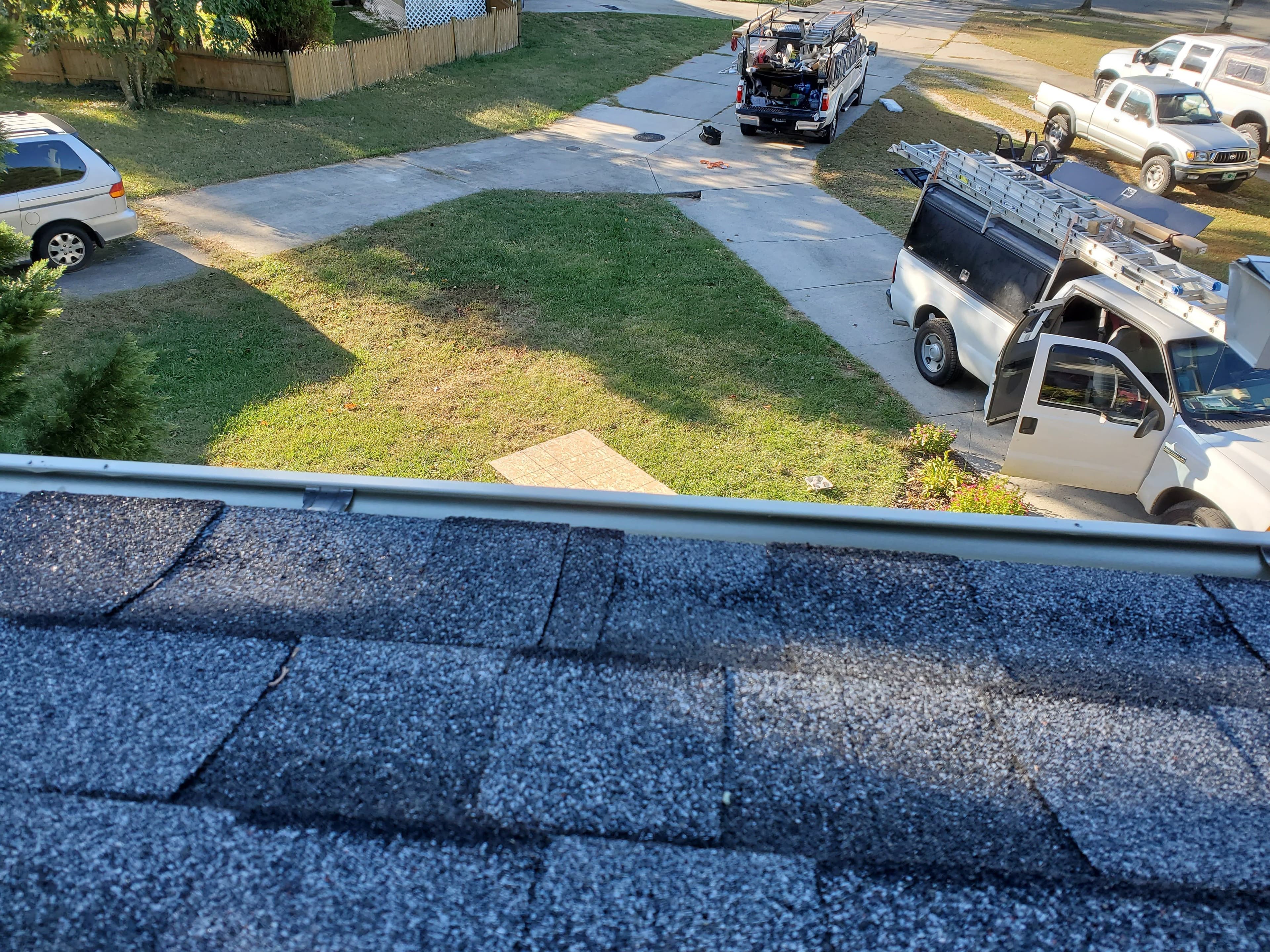 Apper Construction roofing crew installing a new asphalt shingle roof on a Maryland home