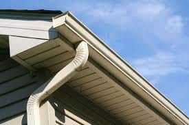 Seamless aluminum gutters and downspout installation by Apper Construction on a Maryland home in Odenton