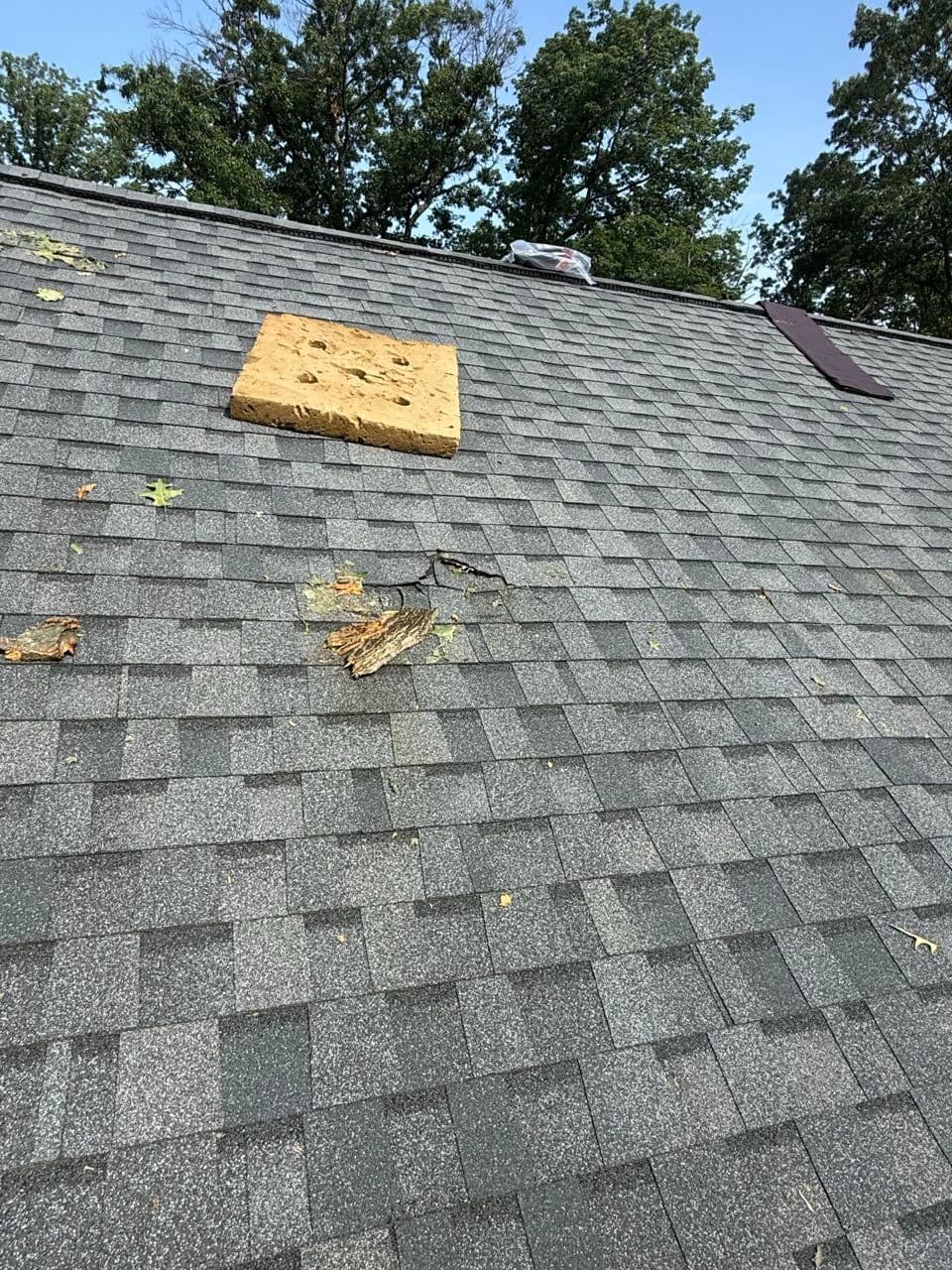 New plywood decking patch installed over storm-damaged roof sheathing in Severn, Maryland by Apper Construction
