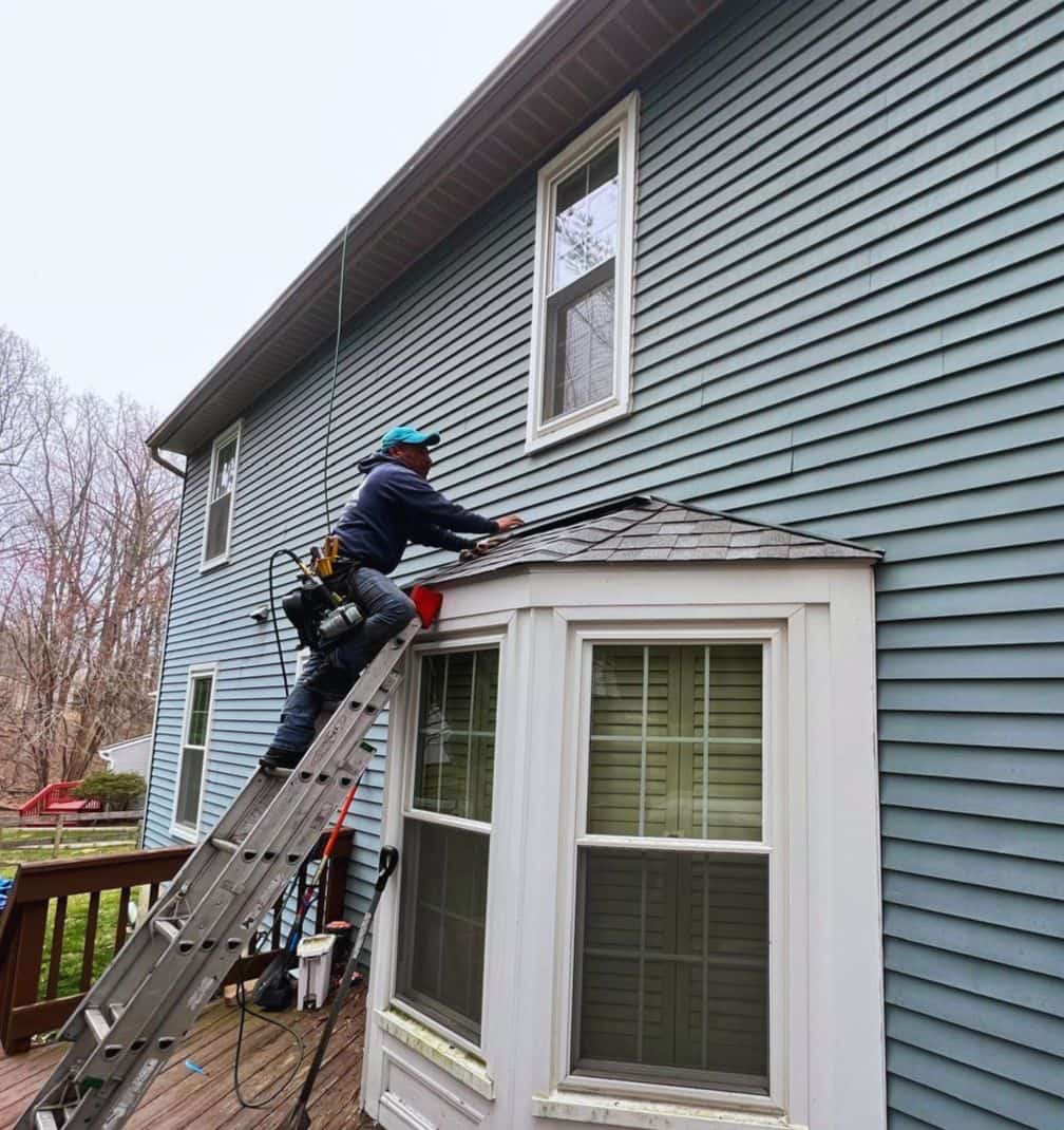 New lap siding and replacement window install on a Maryland craftsman home by Apper Construction's Anne Arundel County crew